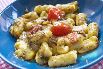 gnocchi with pesto and fresh tomatoes