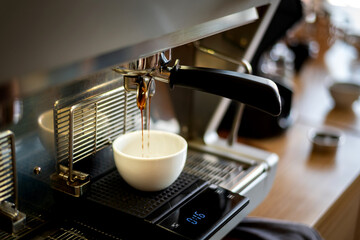 Close up Espresso coffee machine piston and digital scales  on blurred background.Photo select...