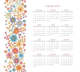 Calendar for 2022 year. Week starts on sunday. Vector template with floral ornament of colorful embroidered flowers, leaves and berries.