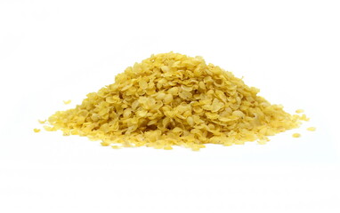 Millet flakes isolated on white bacground.