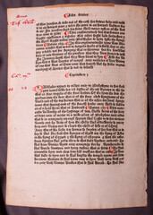 An original leaf from William Caxton's 1482 first edition, Polycronicon. It is printed with red rubricated initials in a black lettre batarde type on paper.  Printed in Westminster, London.