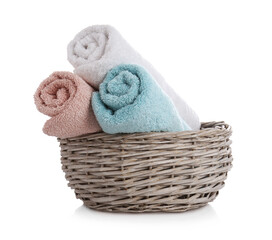 Fototapeta na wymiar Wicker basket with clean towels isolated on white