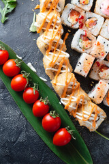 Sushi rolls with sauce close-up