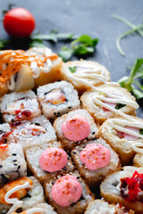Sushi rolls with sauce close-up