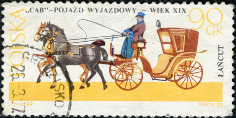 Fototapeta na wymiar POLAND - CIRCA 1967: a stamp printed in Poland shows antique horse carriage and a coachman