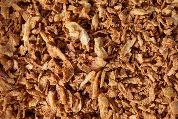 Full frame macro shot of ingredient fried onions.