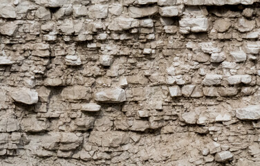 weathered chalk rock cliff face 