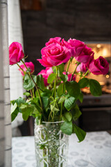 Beautiful flower bouquet of pink rose. Big bouquet of roses in vase on table.