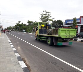 truck on the road, or truk lewat di jalan, Magelang, Jawa Tengah, Indonesia