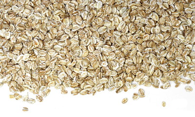 Rye oat flakes isolated on white , macro close up