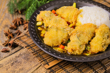 Fried fish in Chinese sauce with rice