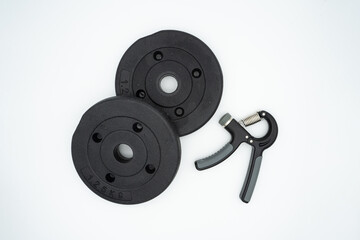 Concept image for healthy home training with grip and dumbbells