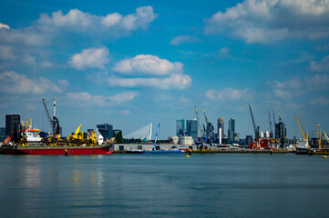 Rotterdam, Netherlands - August 4, 2019: Cranes of the Port of Rotterdam in the Netherlands - 415375956