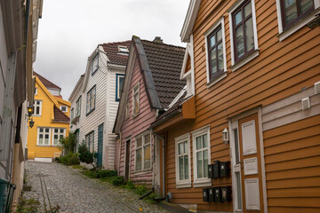 Fototapeta na wymiar Pretty, traditional weatherboarded houses on Knøsesmauet, Nøstet, Bergen, Norway