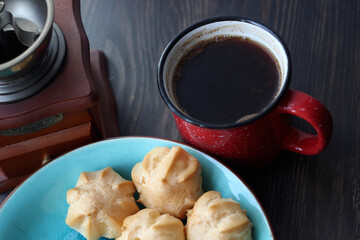 cup of coffee and cookies