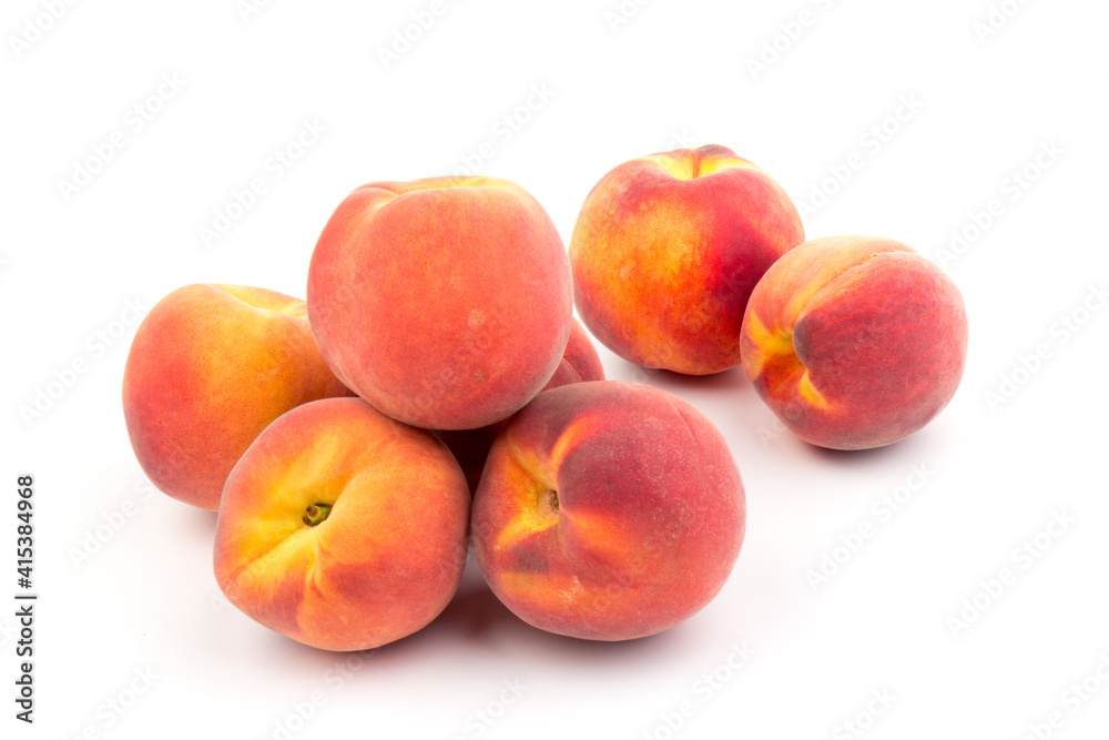 Wall mural summer fruit background. ripe juicy peaches on white background. copy space. fresh organic fruit veg