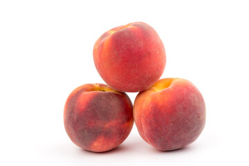 Summer fruit background. Ripe juicy peaches on white background. Copy space. Fresh organic fruit vegan food. Harvest concept