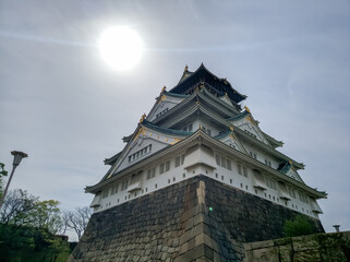 OSAKA, JAPAN - APRIL 4, 2018: Osakajo Great White Castle in Osaka, Japan. Construction of Osaka Castle, osakajo began in 1583 on the site of the former Ishiyama Hongan-ji Temple.