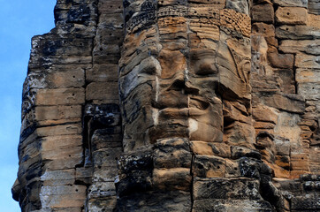 Face on Khmer temple near Angkor Wat