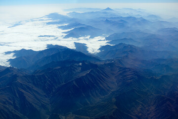 Aerial view blue mountain landscape with river valley 