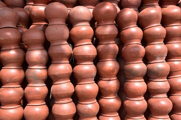 clay orange pots stacked 