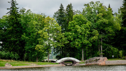 Fototapeta na wymiar bridge in the park, river, landscape, nature, water, tree, park, lake, sky, forest, green, summer, trees, blue, grass, outdoors, cloud, reflection, beautiful, clouds, panorama, travel, scene, beauty