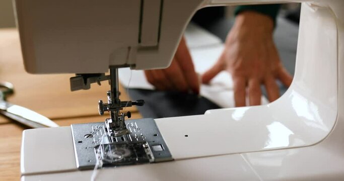 Step by step, Woman dressmaker making sewing patterns, Mature tailor working with sewing pattern in atelier, textile industry, hobby, workspace. Creation process DIY, Workplace of seamstress