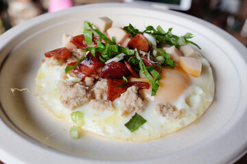 Indochina pan-fried egg with toppings is homemade Thai style and easy breakfast in the morning