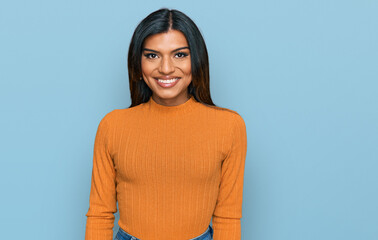 Young latin transsexual transgender woman wearing casual clothes with a happy and cool smile on face. lucky person.