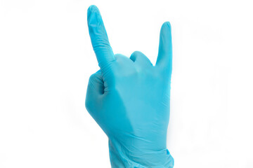 Doctor's hand showed horns gesture (symbol of heavy metal) in blue medical (surgical) gloves on white background. 