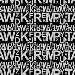 Fototapeta premium Light gray letters on a black background.