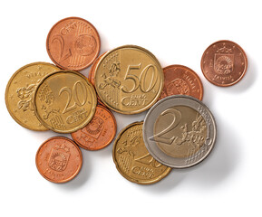 Euro coins isolated on white background closeup. Money concept. Top view, flat lay.