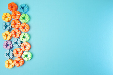 Plastic building blocks isolated on blue background. Top view with copy space