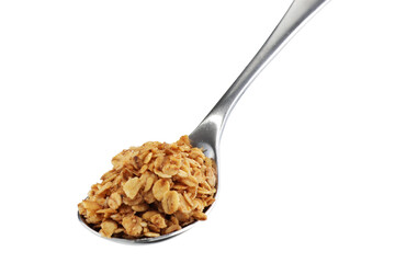 Stainless steel spoon inclined with granola oats