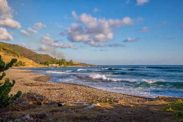 a view of an expanse of sea coast