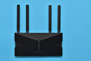 Modern wi-fi 6 router on a blue background