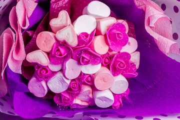close up of pink rose petals on white, bouquet of a pink marshmallows