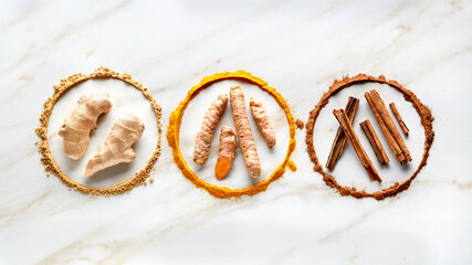Circle of ingredients spices for masala tea on marble background
