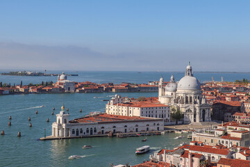 Panoramic bird's eye view of the Basilica of Santa Maria della Salute, the Grand Canal and the Venetian lagoon from the Campanile tower of the Basilica of San Marco