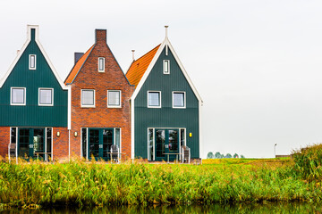 Volendam is a town in North Holland in the Netherlands. Colored houses of marine park in Volendam. North Holland, Netherlands..