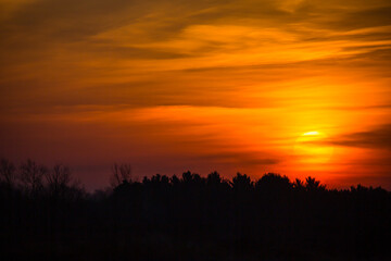 Obraz premium Colorful sunset sky and clouds with dramatic light and copy space
