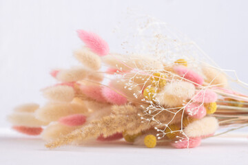 Bouquet of dried flowers on a white background.
