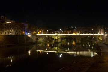 Night scene of Rome, Tevere river with city in background