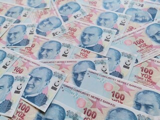 Turkish lira. One hundred Turkish Lira. One hundred liras. Moneys. Finance and economy. Background coins.