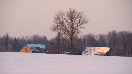 Lithuanian village, winter landscape, lots of snow.