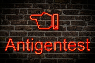 Fototapeta premium Leuchtreklame Antigentest