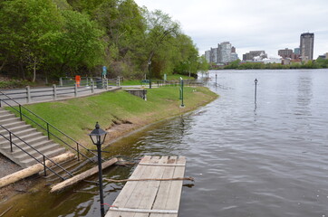 flooded river and buildings in Ottawa, Canada