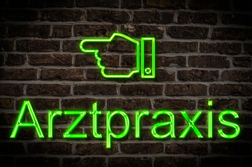 Fototapeta premium Leuchtreklame Arztpraxis