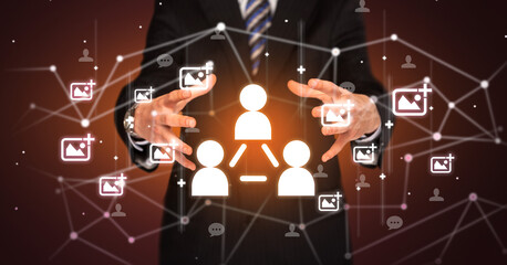 Hand holdig social connection icon around his hands, Social networking concept