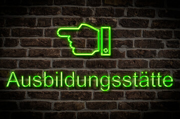 Fototapeta premium Leuchtreklame Ausbildungsstätte